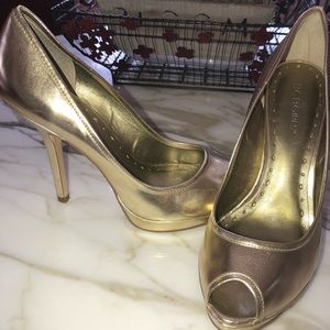 BCBG metallic gold pumps